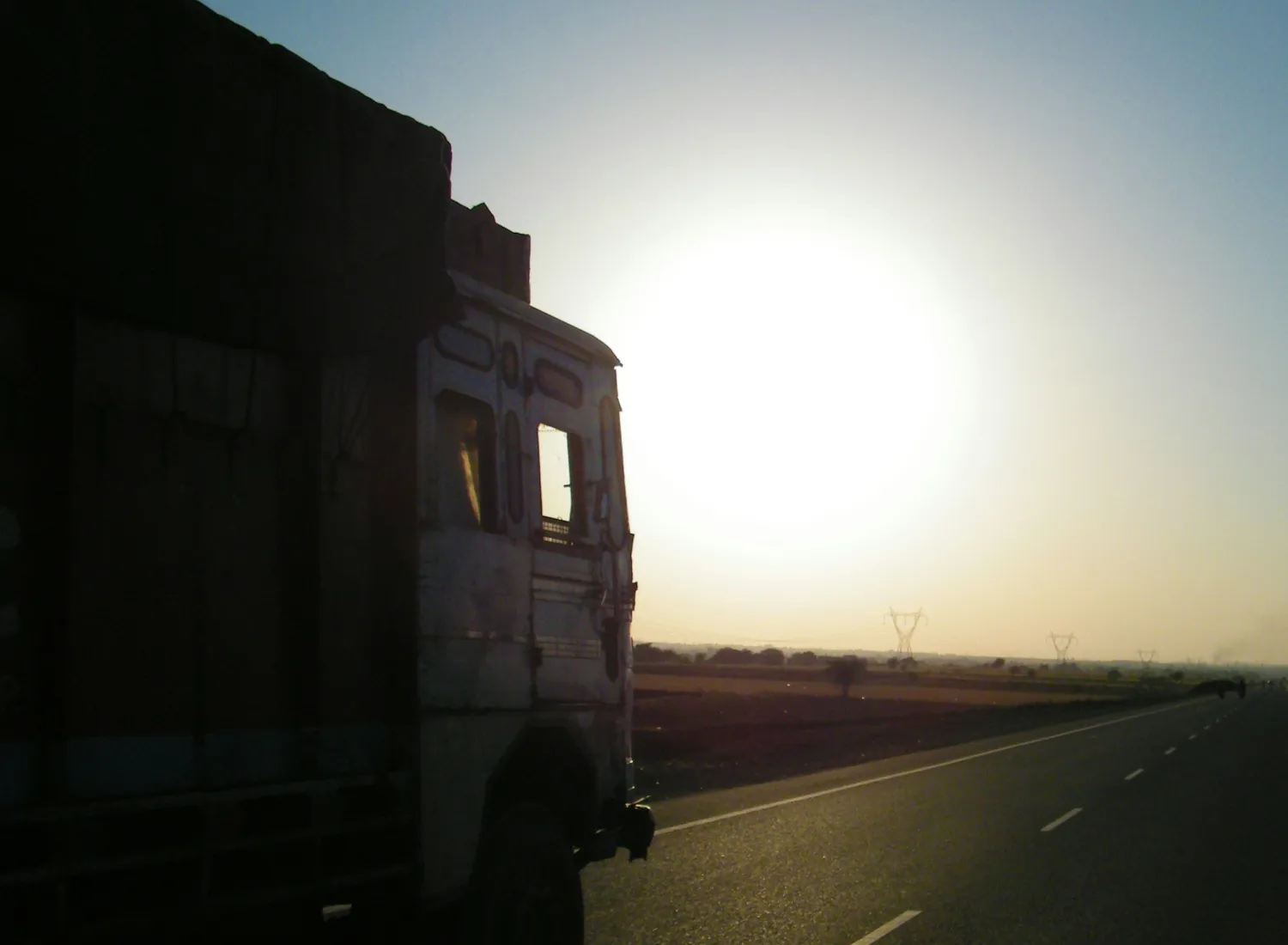 Image of a Lorry delivering surplus food and drink to its final destination.