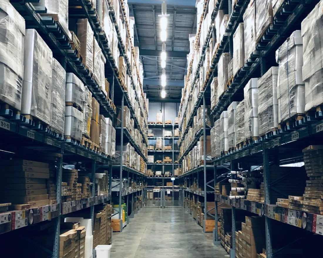 Image of a warehouse with surplus stock ready to be sold.